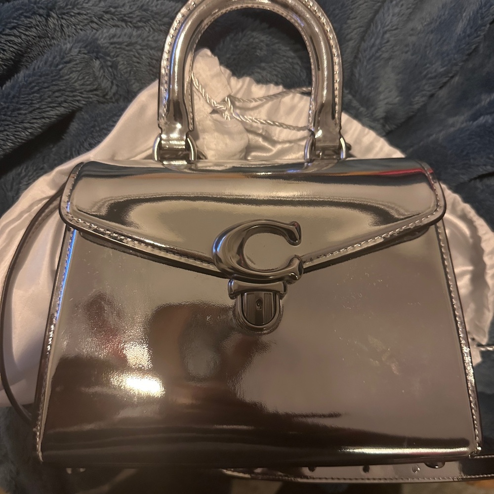 Coach metallic Sammy top handle.